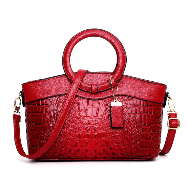 Alfrida | Elegante Handtasche mit anspruchsvoller Krokodil-Prägung