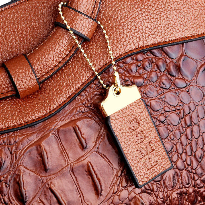 Alfrida | Elegante Handtasche mit anspruchsvoller Krokodil-Prägung
