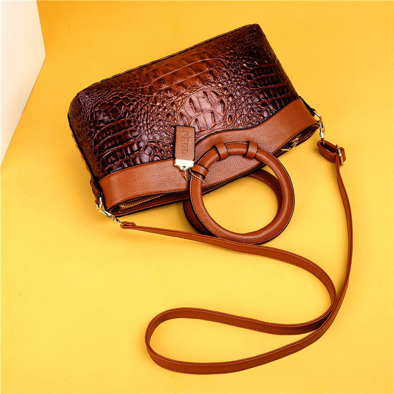 Alfrida | Elegante Handtasche mit anspruchsvoller Krokodil-Prägung